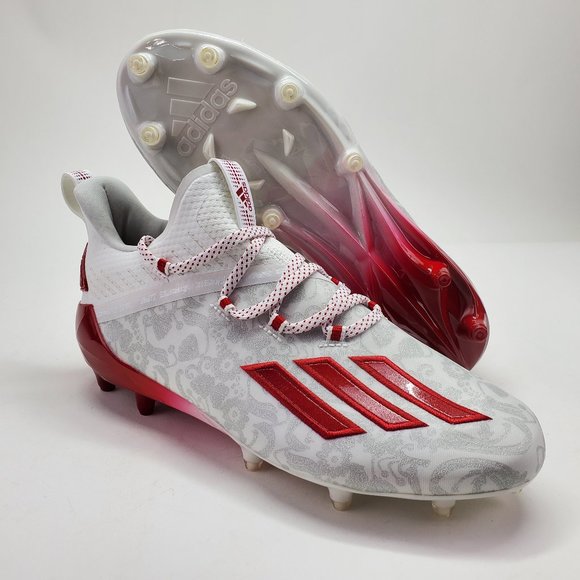 white and red football cleats